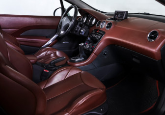 Подержанный автомобиль Peugeot 308 Convertible 2009 года (15 фото)