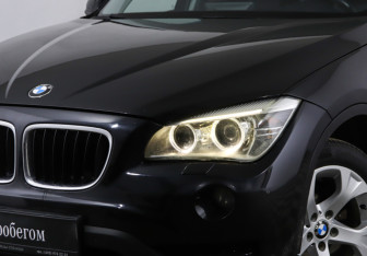 Подержанный автомобиль BMW X1 2012 года (18 фото)