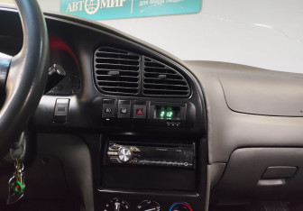 Подержанный автомобиль Kia Spectra Sedan 2007 года (17 фото)