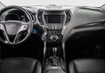 Подержанный автомобиль Hyundai Santa Fe 2015 года (11 фото)