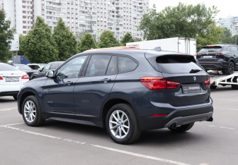 Подержанный автомобиль BMW X1 2015 года (7 фото)