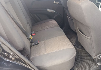 Подержанный автомобиль Kia Sportage 2010 года (11 фото)