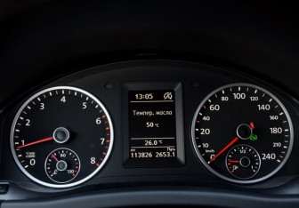 Подержанный автомобиль Volkswagen Tiguan 2014 года (6 фото)