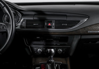 Подержанный автомобиль Audi A7 2014 года (13 фото)