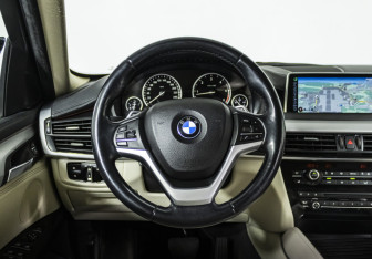 Подержанный автомобиль BMW X6 2015 года (11 фото)