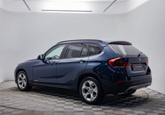 Подержанный автомобиль BMW X1 2014 года (7 фото)