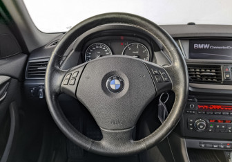 Подержанный автомобиль BMW X1 2014 года (20 фото)