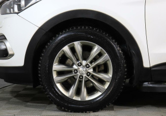 Подержанный автомобиль Hyundai Santa Fe 2016 года (6 фото)