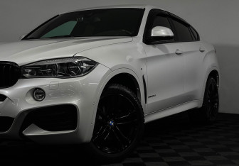 Подержанный автомобиль BMW X6 2018 года (19 фото)