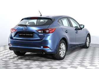 Подержанный автомобиль Mazda 3 Hatchback 2017 года (6 фото)