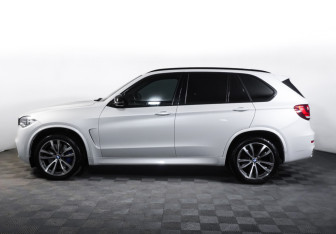 Подержанный автомобиль BMW X5 2015 года (8 фото)