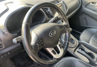 Подержанный автомобиль Kia Sportage 2013 года (14 фото)