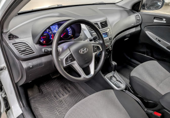 Подержанный автомобиль Hyundai Solaris Sedan 2013 года (16 фото)