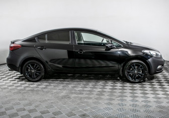 Подержанный автомобиль Kia Cerato Sedan 2014 года (4 фото)