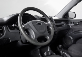 Подержанный автомобиль Kia Sportage 2009 года (14 фото)