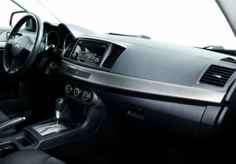Подержанный автомобиль Mitsubishi Lancer Sedan 2013 года (8 фото)
