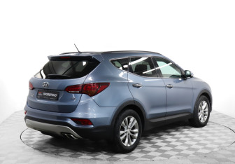 Подержанный автомобиль Hyundai Santa Fe 2015 года (5 фото)