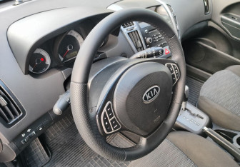 Подержанный автомобиль Kia Ceed Hatchback 2008 года (14 фото)