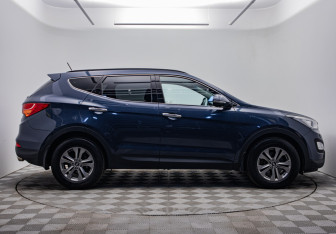 Подержанный автомобиль Hyundai Santa Fe 2015 года (6 фото)