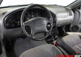 Подержанный автомобиль Kia Spectra Sedan 2006 года (14 фото)