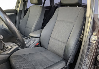 Подержанный автомобиль BMW X1 2014 года (18 фото)