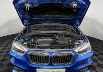 Подержанный автомобиль BMW X1 2018 года (10 фото)