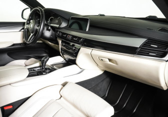 Подержанный автомобиль BMW X6 2016 года (11 фото)