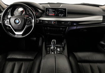Подержанный автомобиль BMW X6 2016 года (12 фото)