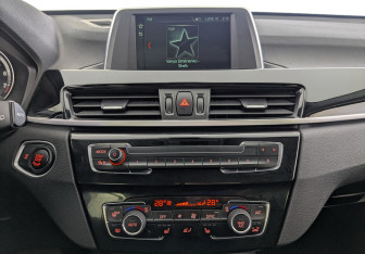 Подержанный автомобиль BMW X1 2018 года (26 фото)