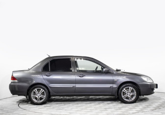 Подержанный автомобиль Mitsubishi Lancer Sedan 2009 года (4 фото)