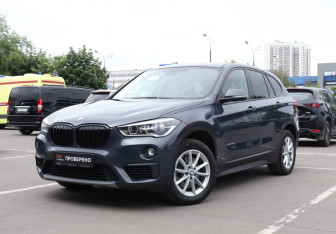 Подержанный автомобиль BMW X1 2015 года (23 фото)