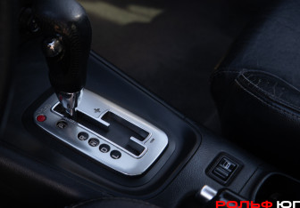 Подержанный автомобиль Nissan Primera Sedan 2003 года (15 фото)