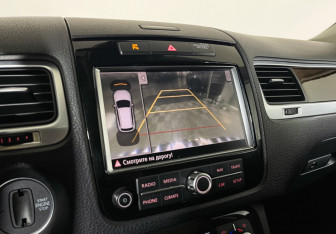 Подержанный автомобиль Volkswagen Touareg 2014 года (17 фото)