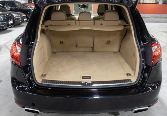 Подержанный автомобиль Porsche Cayenne 2011 года (10 фото)