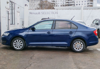 Подержанный автомобиль Skoda Rapid Liftback 2014 года (8 фото)