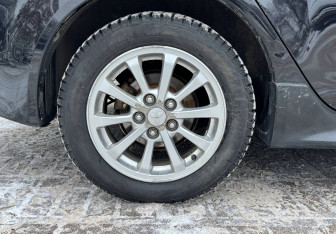 Подержанный автомобиль Mitsubishi Lancer Sedan 2012 года (13 фото)