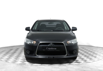 Подержанный автомобиль Mitsubishi Lancer Sedan 2011 года (2 фото)
