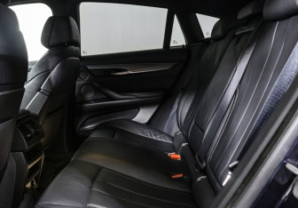 Подержанный автомобиль BMW X6 2017 года (14 фото)