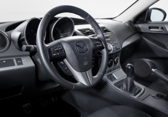 Подержанный автомобиль Mazda 3 Hatchback 2009 года (14 фото)