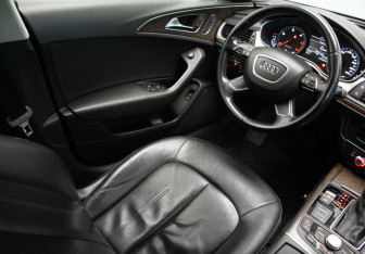 Подержанный автомобиль Audi A6 allroad 2014 года (20 фото)