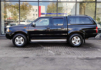 Подержанный автомобиль Nissan NP300 2010 года (5 фото)