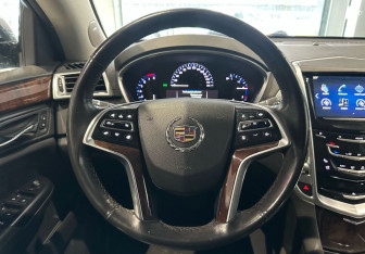 Подержанный автомобиль Cadillac SRX 2013 года (13 фото)