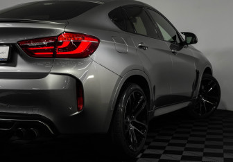 Подержанный автомобиль BMW X6 M 2016 года (28 фото)