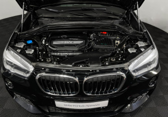 Подержанный автомобиль BMW X1 2018 года (10 фото)