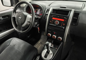 Подержанный автомобиль Nissan X-Trail 2012 года (10 фото)