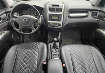 Подержанный автомобиль Kia Sportage 2010 года (9 фото)