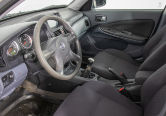 Подержанный автомобиль Nissan Almera Hatchback 2006 года (10 фото)