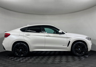 Подержанный автомобиль BMW X6 2018 года (6 фото)