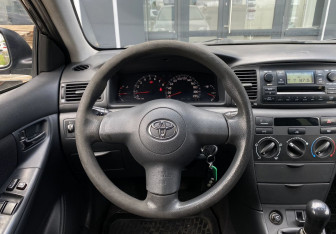 Подержанный автомобиль Toyota Corolla Sedan 2006 года (14 фото)