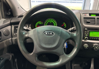 Подержанный автомобиль Kia Sportage 2009 года (14 фото)